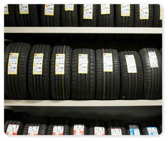 A row of tires on a shelf at Hemlock Auto & Alignment
