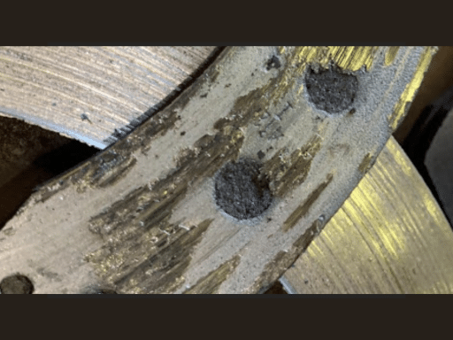 Car shaking due to warped rotors in Hemlock, MI. Closeup image of a warped brake rotor at Hemlock Auto & Alignment.
